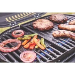 Coleman RoadTrip® 225 Portable Stand-Up Propane Grill -Coleman Sales 2000033048 coleman grill 225 su black close up of food on grate in use 2